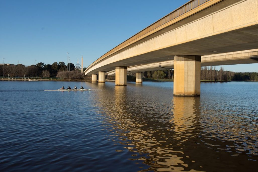 Rowers in Lake Burley Griffin, under Commonwealth Avenue. Image by Brenton Pearce from Unsplash.